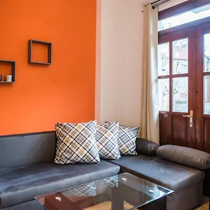 Orange Geranium Apartment